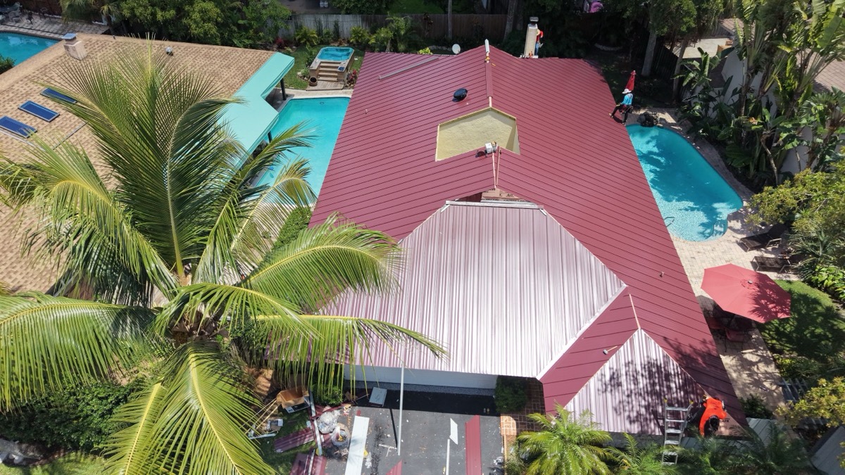 Completed standing seam metal roof installation, drone view, Miami-Dade
