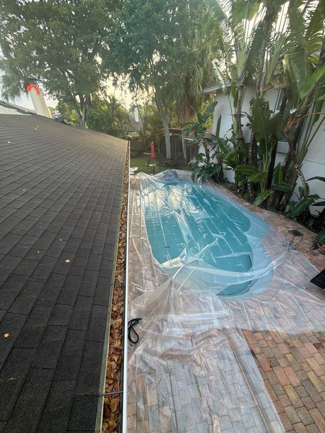 Protected — Kaizen Roofing roof replacement in Miami-Dade: Pool & property protected throughout the job