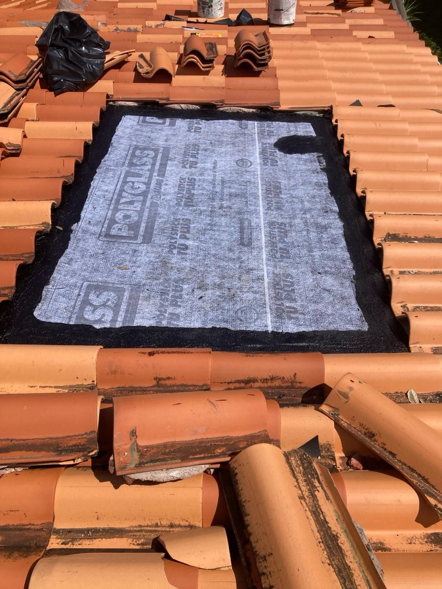 Storm and leak repair with fresh waterproof membrane on a Florida roof